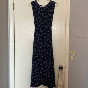 Blue floral long sleeveless dress.